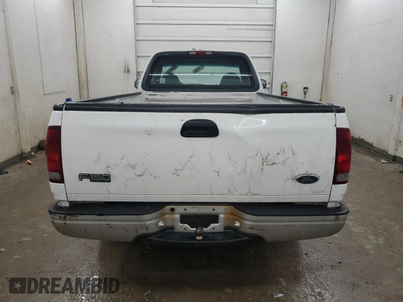 2000 Ford F-150 XL with VIN 1FTRF17L7YNB52822, listed as a Copart auction lot 43421495 with 103,753 mi miles and Salvage title. Bid and sale history available at DreamBid. Image 6.