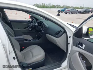 2015 Kia Optima EX with VIN 5XXGN4A76FG491572, listed as a IAAI auction lot 41940147 with 119,770 mi miles. Bid and sale history available at carsss.com. Image 5.