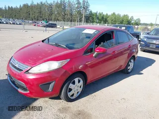 2012 Ford Fiesta SE with VIN 3FADP4BJ1CM115692, listed as a IAAI auction lot 42206208 with 108,996 mi miles and . Bid and sale history available at DreamBid. Image 2.