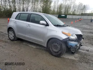 2011 Scion xD with VIN JTKKU4B44B1014235, listed as a Copart auction lot 52817715 with 96,941 mi miles and Salvage Title. Bid and sale history available at carsss.com. Image 4.