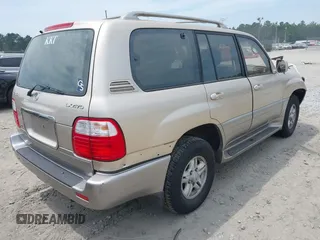 2000 Lexus LX 470 z VIN JT6HT00W7Y0105216, wystawiony jako IAAI lot #42187039 z przebiegiem 191 627 mil mil oraz . Historia ofert i sprzedaży dostępna na DreamBid. Obrazek 4.