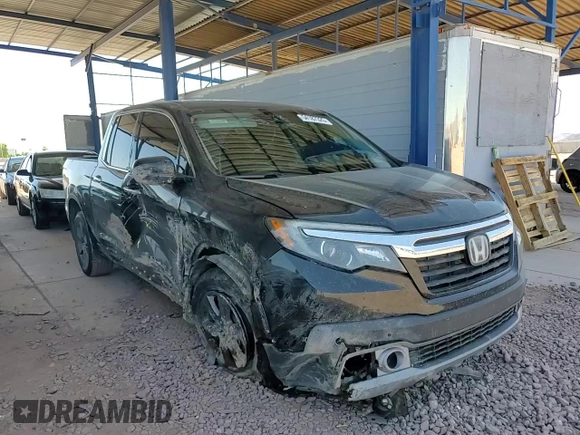 2020 Honda Ridgeline RTL-E with VIN 5FPYK3F75LB009423, listed as a Copart auction lot 54187325 with 96,128 mi miles and Salvage title. Bid and sale history available at DreamBid. Image 13.