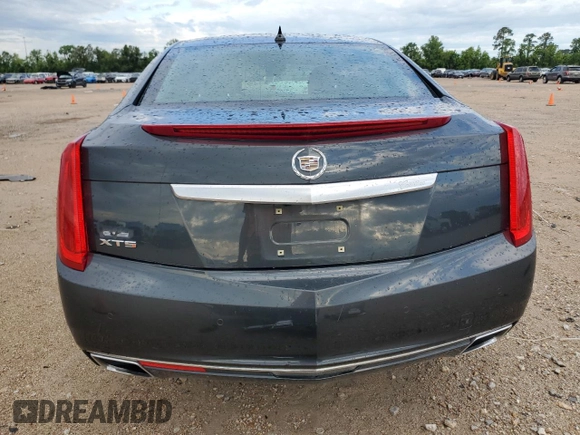 2013 Cadillac XTS Luxury z VIN 2G61P5S33D9217027, wystawiony jako Copart lot #56358835 z przebiegiem 82 644 mil mil oraz Szkoda całkowita • Salvage title. Historia ofert i sprzedaży dostępna na DreamBid. Obrazek 6.