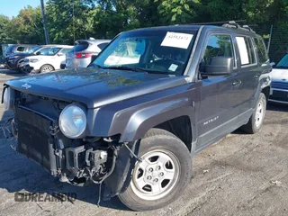 2014 Jeep Patriot Sport with VIN 1C4NJPBA0ED690284, listed as a IAAI auction lot 42513472 with 148,979 mi miles and . Bid and sale history available at DreamBid. Image 2.