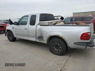 2000 Ford F-150 XL with VIN 1FTRX07L2YKA09673, listed as a Copart auction lot 48177615 with Not provided miles and Salvage title. Bid and sale history available at DreamBid. Image 2.