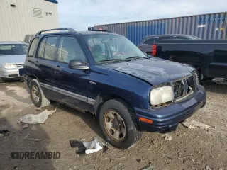 2000 Suzuki Vitara JX z VIN 2S3TD52V6Y6111082, wystawiony jako Copart lot #82444534 z przebiegiem 271 122 mil mil oraz Nie do naprawy. Historia ofert i sprzedaży dostępna na DreamBid. Obrazek 4.