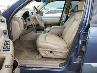 2002 Mercury Mountaineer z VIN 4M2ZU86E62ZJ06894, wystawiony jako Copart lot #56680624 z przebiegiem 200 718 mil mil oraz Nie do naprawy. Historia ofert i sprzedaży dostępna na DreamBid. Obrazek 7.