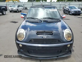 2007 MINI Convertible S with VIN WMWRH33597TJ43818, listed as a Copart auction lot 64623075 with 104,889 mi miles and Clean title. Bid and sale history available at DreamBid. Image 5.