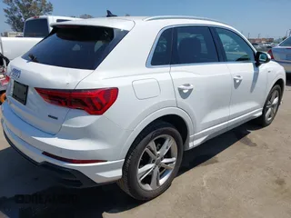 2019 Audi Q3 S line Premium z VIN WA1DECF39K1079763, wystawiony jako IAAI lot #42160517 z przebiegiem 66 924 mil mil oraz . Historia ofert i sprzedaży dostępna na DreamBid. Obrazek 4.