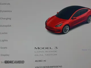 2021 Tesla Model 3 Long Range with VIN 5YJ3E1EB4MF936743, listed as a IAAI auction lot 42154322 with 46,983 mi miles and . Bid and sale history available at DreamBid. Image 15.