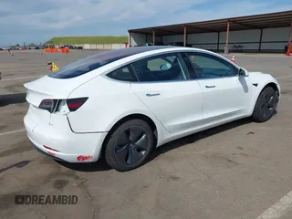 2018 Tesla Model 3 Long Range Battery with VIN 5YJ3E1EA2JF023370, listed as a IAAI auction lot 42008406 with 163,474 mi miles and . Bid and sale history available at DreamBid. Image 4.