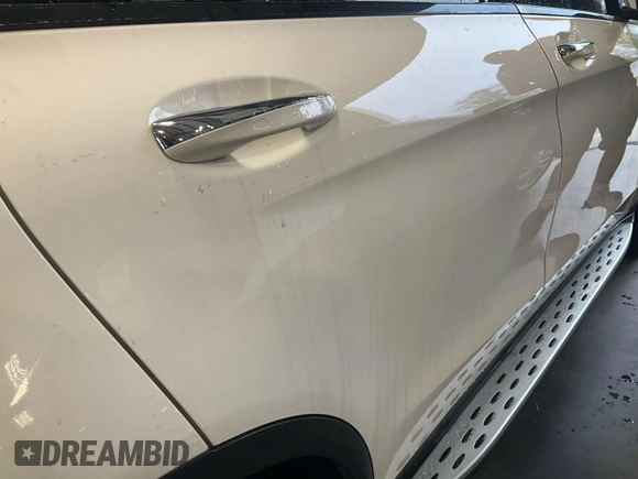 2021 Mercedes-Benz GLC 300 z VIN W1N0G8EB1MV300510, wystawiony jako IAAI lot #41970630 z przebiegiem 40 722 mil mil oraz . Historia ofert i sprzedaży dostępna na DreamBid. Obrazek 13.