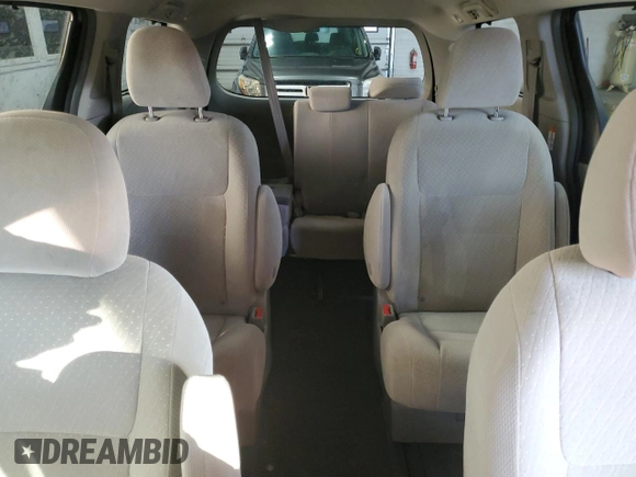 2019 Toyota Sienna LE with VIN 5TDJZ3DC3KS212181, listed as a Copart auction lot 42812395 with 110,974 mi miles and Salvage Title. Bid and sale history available at carsss.com. Image 10.