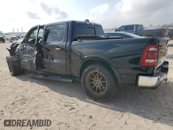 2019 Ram 1500 Laramie with VIN 1C6SRFJT4KN521147, listed as a Copart auction lot 54108615 with 152,888 mi miles and Salvage title. Bid and sale history available at DreamBid. Image 2.