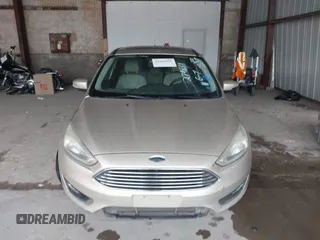 2017 Ford Focus Titanium with VIN 1FADP3J26HL279839, listed as a IAAI auction lot 42466826 with 202,795 mi miles and . Bid and sale history available at DreamBid. Image 12.