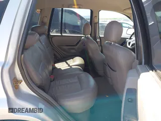 2002 Jeep Grand Cherokee Laredo with VIN 1J4GX48S52C249574, listed as a IAAI auction lot 42458883 with 89,028 mi miles and . Bid and sale history available at DreamBid. Image 8.