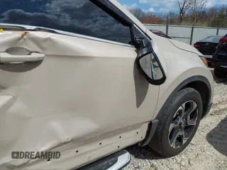 2017 Honda CR-V Touring with VIN 5J6RW2H94HL013536, listed as a IAAI auction lot 41577317 with 97,132 mi miles. Bid and sale history available at carsss.com. Image 17.