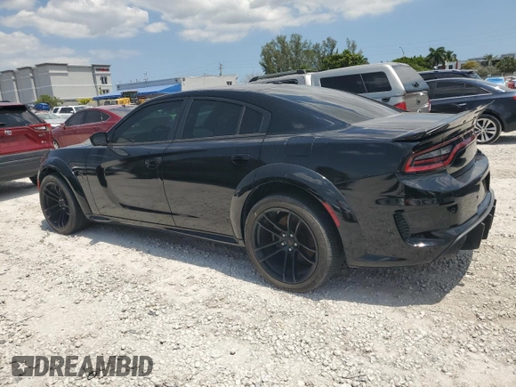 2021 Dodge Charger SRT Hellcat Widebody z VIN 2C3CDXL93MH660916, wystawiony jako Copart lot #51233805 z przebiegiem 27 729 mil mil oraz Czysty tytuł • Clean title. Historia ofert i sprzedaży dostępna na DreamBid. Obrazek 2.