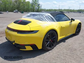 2022 Porsche 911 Carrera S z VIN WP0CB2A92NS245314, wystawiony jako IAAI lot #42086408 z przebiegiem 29 193 mil mil oraz . Historia ofert i sprzedaży dostępna na DreamBid. Obrazek 4.