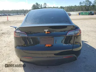 2023 Tesla Model Y Performance with VIN 7SAYGDEF2PF828973, listed as a Copart auction lot 45276585 with 15,750 mi miles and Salvage Title. Bid and sale history available at DreamBid. Image 6.