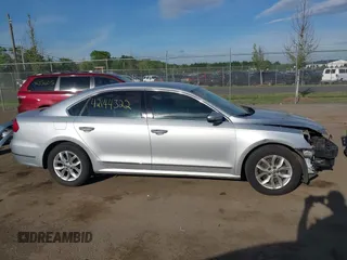 2016 Volkswagen Passat S with VIN 1VWAT7A39GC014305, listed as a IAAI auction lot 42144322 with 187,419 mi miles and . Bid and sale history available at DreamBid. Image 14.