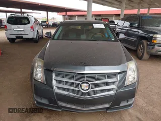2011 Cadillac CTS Luxury with VIN 1G6DF5EY6B0104932, listed as a IAAI auction lot 42032457 with 165,833 mi miles and . Bid and sale history available at DreamBid. Image 6.
