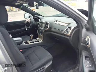 2016 Jeep Grand Cherokee Laredo with VIN 1C4RJFAG3GC366613, listed as a IAAI auction lot 42503974 with 156,013 mi miles and . Bid and sale history available at DreamBid. Image 5.