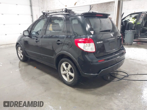 2009 Suzuki SX4 Man AWD with VIN JS2YB413596200885, listed as a IAAI auction lot 41189776 with 111,891 mi miles. Bid and sale history available at carsss.com. Image 3.