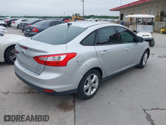 2013 Ford Focus SE z VIN 1FADP3F25DL189133, wystawiony jako IAAI lot #42438118 z przebiegiem 122 350 mil mil oraz . Historia ofert i sprzedaży dostępna na DreamBid. Obrazek 4.