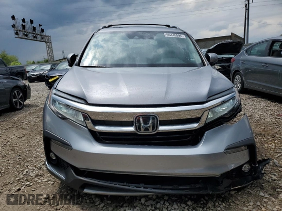 2022 Honda Pilot Touring 7-Passenger with VIN 5FNYF6H69NB019572, listed as a Copart auction lot 55446895 with 82,424 mi miles and Salvage title. Bid and sale history available at DreamBid. Image 5.