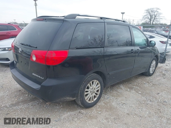 2009 Toyota Sienna XLE with VIN 5TDZK22C09S225520, listed as a IAAI auction lot 42126813 with 217,573 mi miles. Bid and sale history available at carsss.com. Image 4.