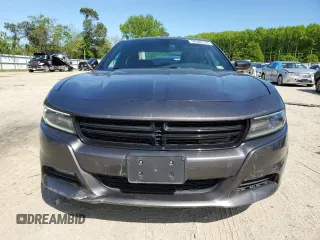 2015 Dodge Charger SXT with VIN 2C3CDXHG8FH794623, listed as a Copart auction lot 52000144 with 145,624 mi miles and Salvage Title. Bid and sale history available at DreamBid. Image 5.