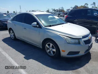 2014 Chevrolet Cruze 1LT with VIN 1G1PC5SB0E7158038, listed as a IAAI auction lot 41946995 with 164,578 mi miles and . Bid and sale history available at DreamBid. Image 1.