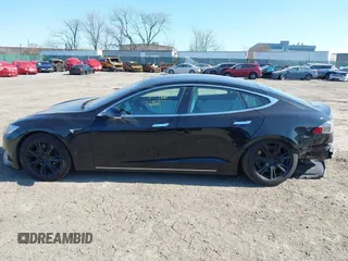 2020 Tesla Model S Long Range with VIN 5YJSA1E23LF381872, listed as a IAAI auction lot 41763046 with 96,720 mi miles and . Bid and sale history available at DreamBid. Image 15.