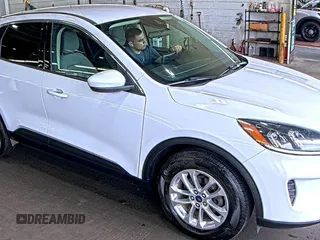 2020 Ford Escape SE with VIN 1FMCU9G65LUB14830, listed as a IAAI auction lot 42626639 with 102,867 mi miles and . Bid and sale history available at DreamBid. Image 1.
