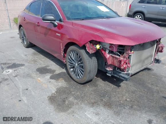 2019 Toyota Avalon Hybrid Limited with VIN 4T1B21FB4KU009762, listed as a IAAI auction lot 41707299 with 156,143 mi miles. Bid and sale history available at carsss.com. Image 1.