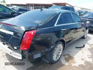 2014 Cadillac CTS Vsport RWD z VIN 1G6AU5S84E0149790, wystawiony jako IAAI lot #42369928 z przebiegiem 96 715 mil mil oraz . Historia ofert i sprzedaży dostępna na DreamBid. Obrazek 4.