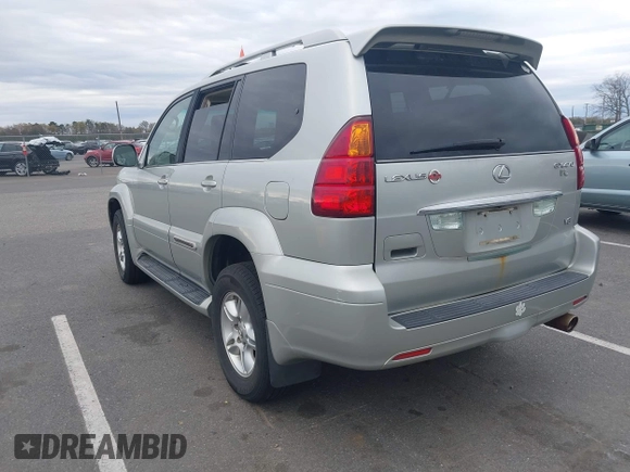 2004 Lexus GX with VIN JTJBT20X240063922, listed as a IAAI auction lot 42087170 with 251,366 mi miles. Bid and sale history available at carsss.com. Image 3.