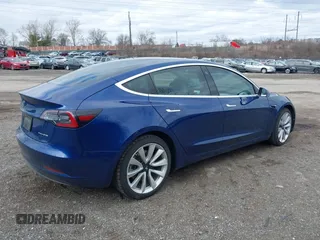 2020 Tesla Model 3 Long Range with VIN 5YJ3E1EB9LF601198, listed as a IAAI auction lot 41744287 with 70,322 mi miles and . Bid and sale history available at DreamBid. Image 4.