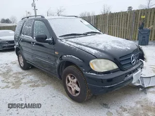 2001 Mercedes-Benz M-Class with VIN 4JGAB54E21A252034, listed as a IAAI auction lot 41573177 with 168,672 mi miles. Bid and sale history available at carsss.com. Image 1.