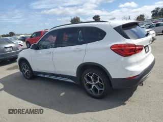 2017 BMW X1 sDrive28i with VIN WBXHU7C39H5H37756, listed as a Copart auction lot 50769975 with 82,479 mi miles and Salvage Title. Bid and sale history available at carsss.com. Image 2.