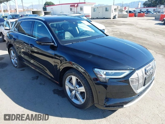 2019 Audi e-tron Premium Plus with VIN WA1LAAGE9KB021724, listed as a IAAI auction lot 41643596 with 34,804 mi miles. Bid and sale history available at carsss.com. Image 1.