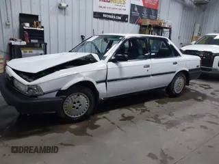 1990 Toyota Camry z VIN JT2SV21E5L3398379, wystawiony jako IAAI lot #41699413 z przebiegiem 100 136 mil mil oraz . Historia ofert i sprzedaży dostępna na DreamBid. Obrazek 2.