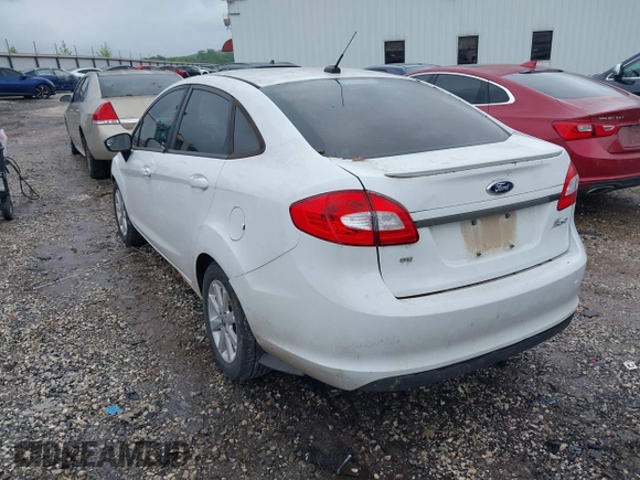 2012 Ford Fiesta SE with VIN 3FADP4BJ0CM220742, listed as a IAAI auction lot 42207303 with 175,875 mi miles and . Bid and sale history available at DreamBid. Image 3.