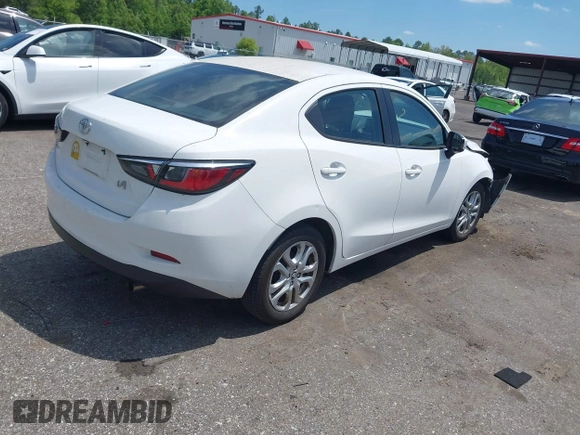 2018 Toyota Yaris with VIN 3MYDLBYV3JY325173, listed as a IAAI auction lot 42041852 with 71,416 mi miles and . Bid and sale history available at DreamBid. Image 4.