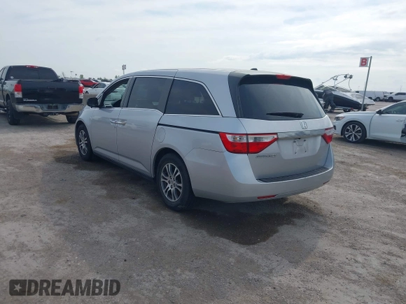 2013 Honda Odyssey EX-L with VIN 5FNRL5H69DB022042, listed as a IAAI auction lot 41902796 with 178,198 mi miles and . Bid and sale history available at carsss.com. Image 3.