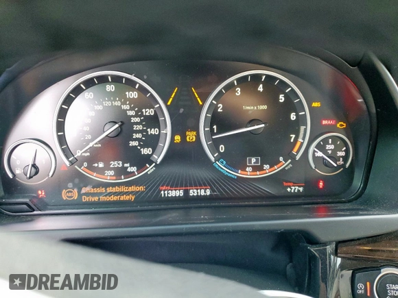 2014 BMW X5 xDrive35i z VIN 5UXKR0C59E0H23070, wystawiony jako Copart lot #55814815 z przebiegiem 113 895 mil mil oraz Szkody całkowita. Historia ofert i sprzedaży dostępna na DreamBid. Obrazek 9.