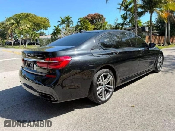 2019 BMW 7 Series 740i z VIN WBA7E2C59KB218XXX, wystawiony jako Copart lot #48633165 z przebiegiem 79 444 mil mil oraz Czysty tytuł • Clean title. Historia ofert i sprzedaży dostępna na DreamBid. Obrazek 4.