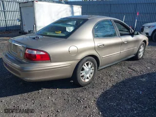 2004 Mercury Sable GS with VIN 1MEFM50U44G608274, listed as a IAAI auction lot 42064275 with 163,420 mi miles. Bid and sale history available at carsss.com. Image 4.