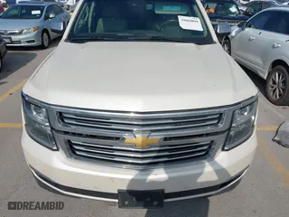 2015 Chevrolet Tahoe LTZ with VIN 1GNSCCKC4FR142856, listed as a IAAI auction lot 39886899 with 134,301 mi miles. Bid and sale history available at carsss.com. Image 6.